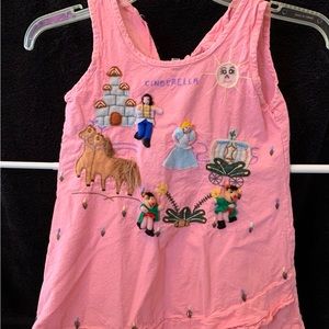 Handmade by fairytales on Parade by Judy characters in 3-D on outside of dress